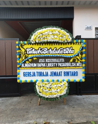 Papan Bunga Duka di Saing