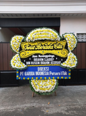 Papan Bunga Duka di Saing